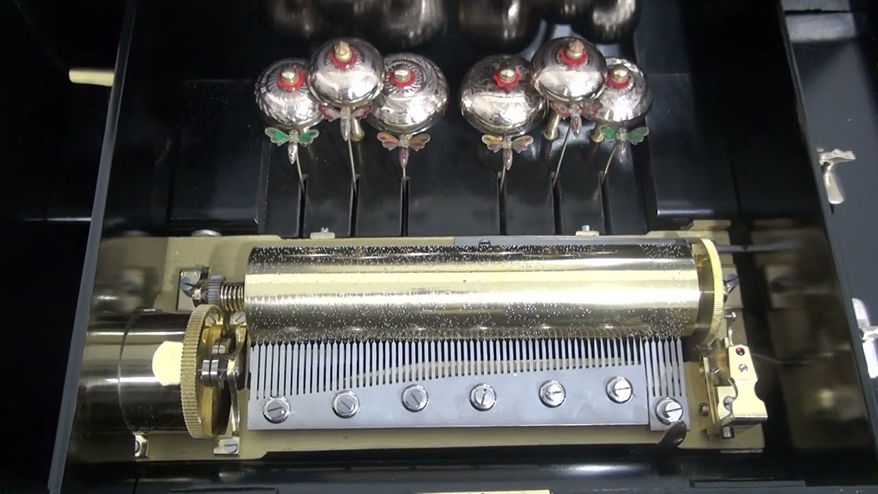 Home Sweet Home: antique music box with 6 engraved bells with bee strikers