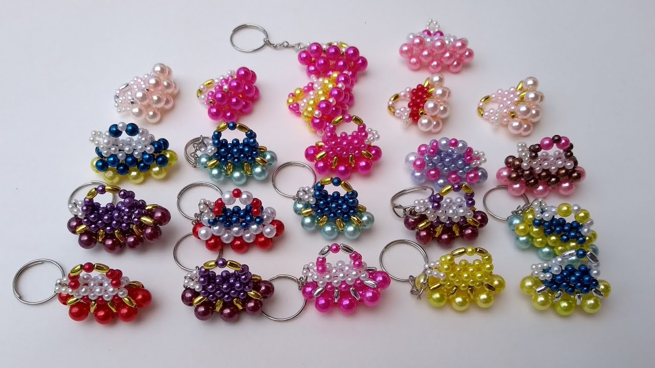 BOLSINHAS CHAVEIROS DE PÉROLAS - Adalto Lopes