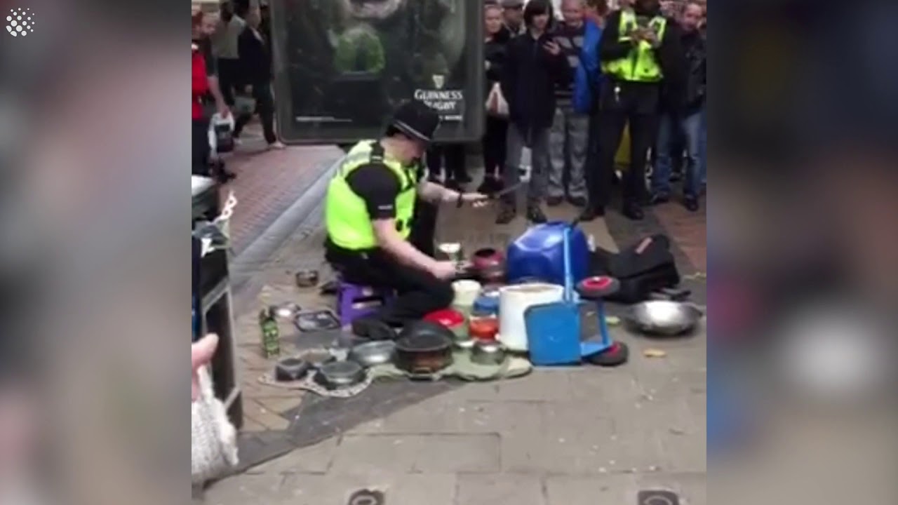 Busker and Police Officer Go Head to Head, Who Was Better?