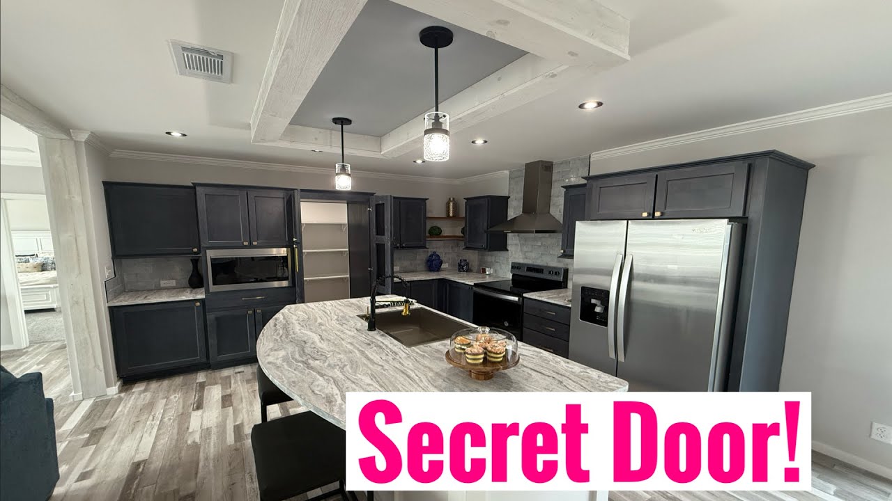 Secret Door Manufactured Home And It Is AMAZING Inside!