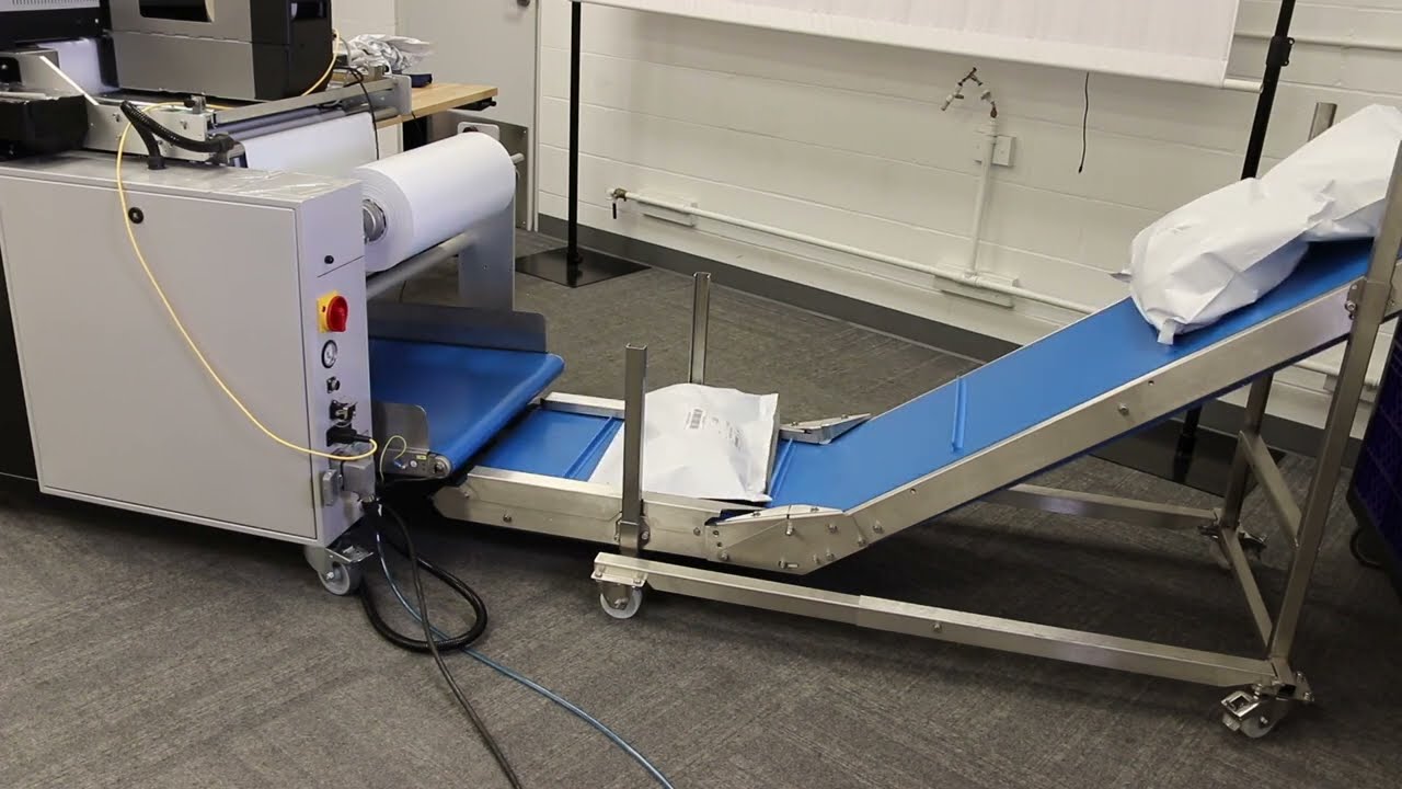 Auto Bagger with Variable Length Poly Mailers - Rollbag R3200XL Fulfillment