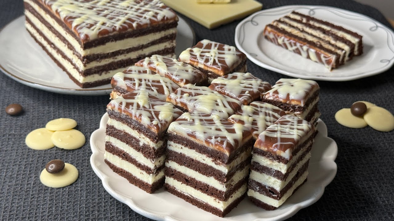 Prăjitura Cuburi de lapte, cu blaturi pufoase de cacao și cremă fină de ciocolată albă, un deliciu