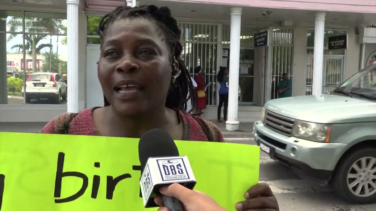 A Lone Castries Woman Protests Issues At The Civil Status Registry