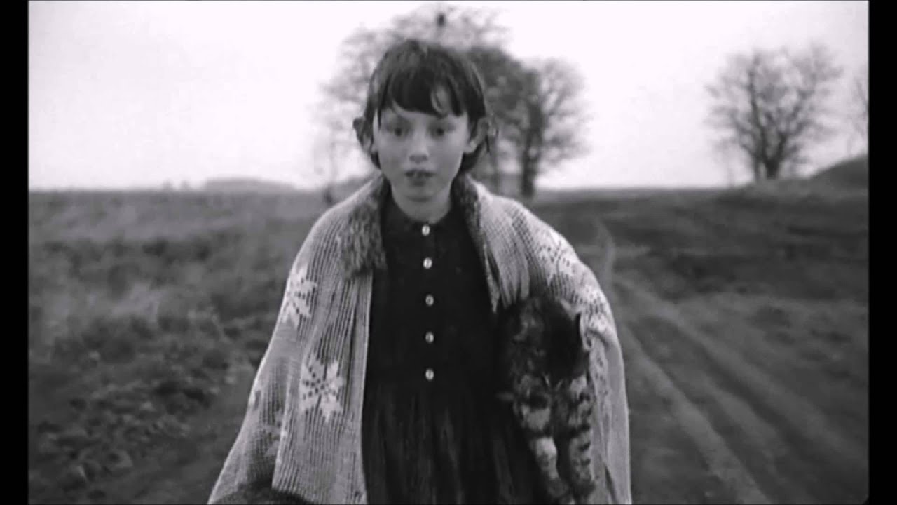 Girl walking with her dead cat - S&aacute;t&aacute;ntang&oacute; - Bela Tarr - 1994