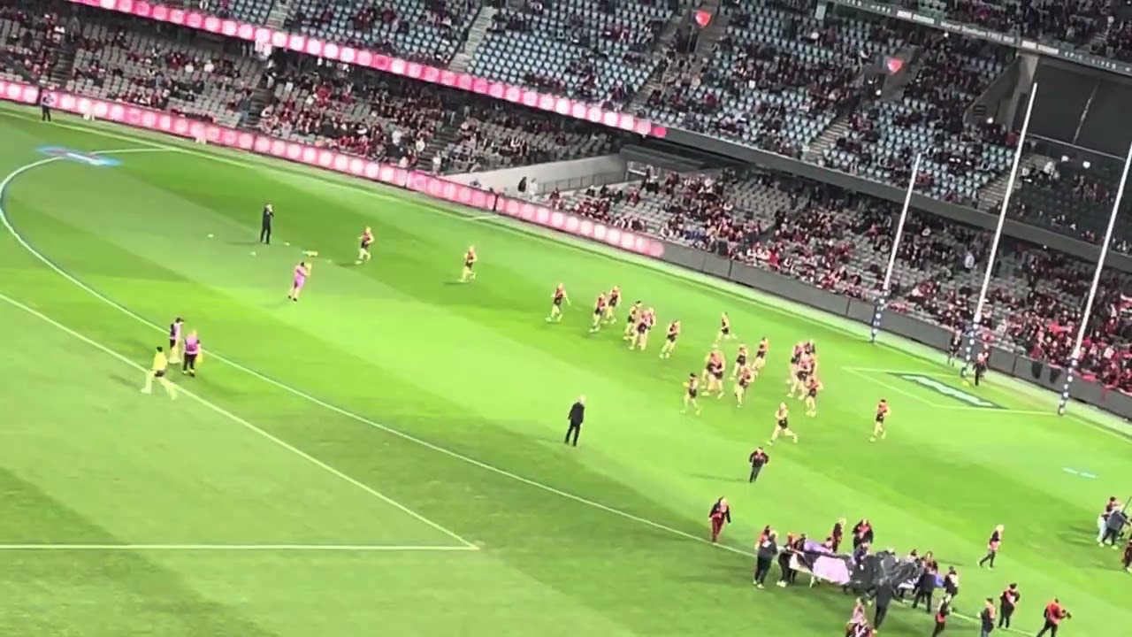 Essendon running out onto the ground!