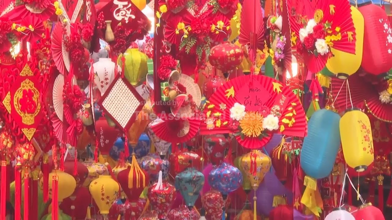 People visit traditional Tet market ahead of Lunar New Year in Vietnam