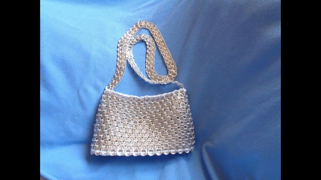 Bolso con anillas de lata y cola de raton