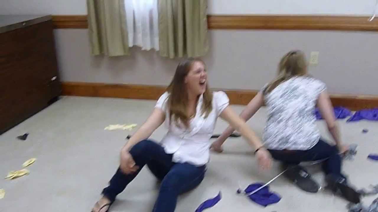 Two amateur girls Pop balloons
