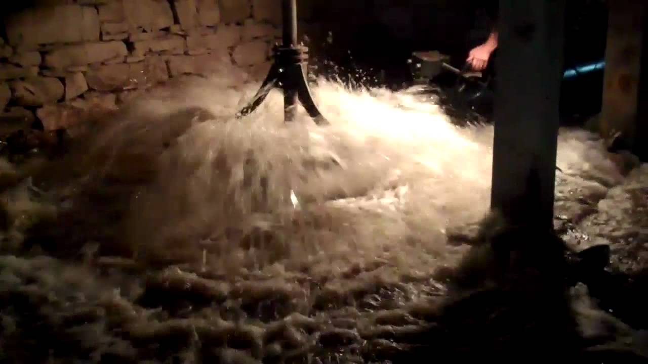 Testing the restored horizontal water turbine at Hanford Mills Museum