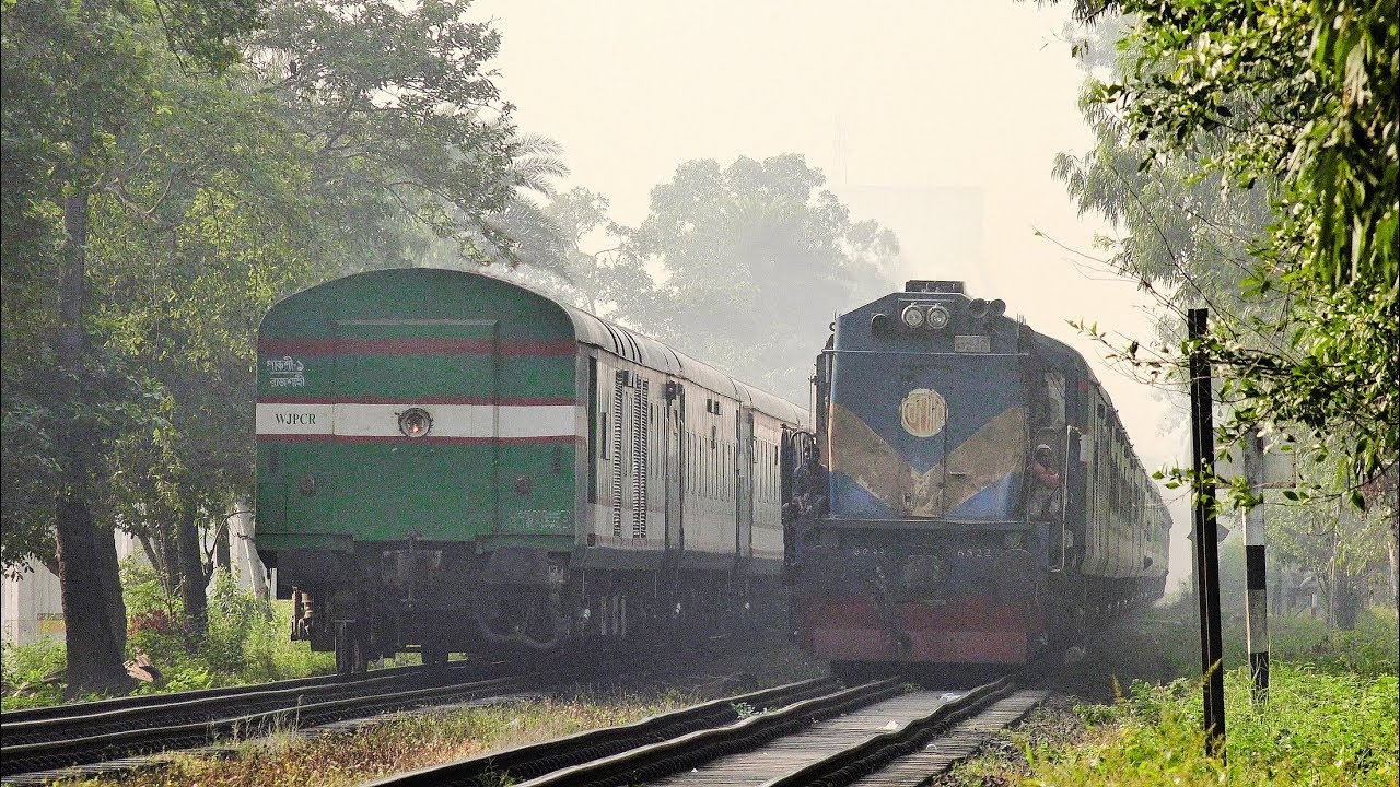 Inter-city Nilsagar Express with new replaced LHB Rakes crossing with Dhumketu Express Train