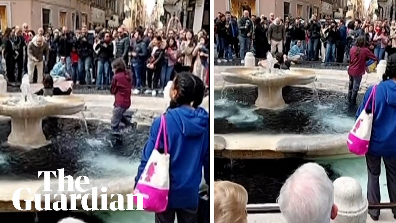 Climate activists pour black liquid into Rome fountain