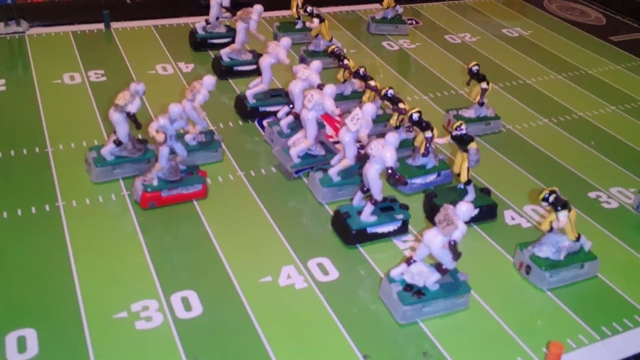 Watch quarterback Joe Tompkins in the pocket looking for his receiver 