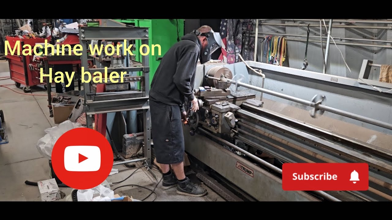 Maintenance on local hay farm baler equipment. 