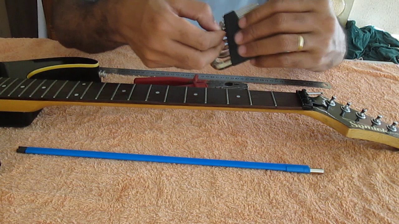 Como Regular o Tensor da Guitarra