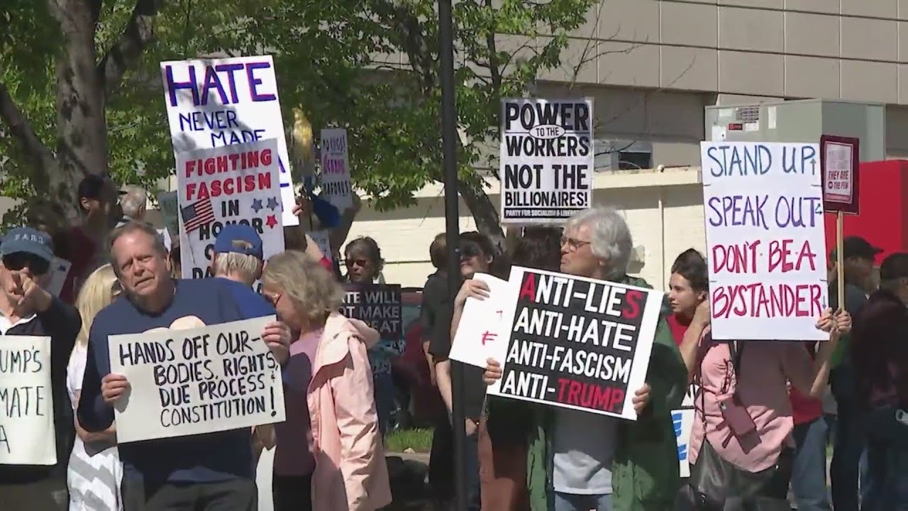Hundreds rally at Kansas City park on International Worker's Day