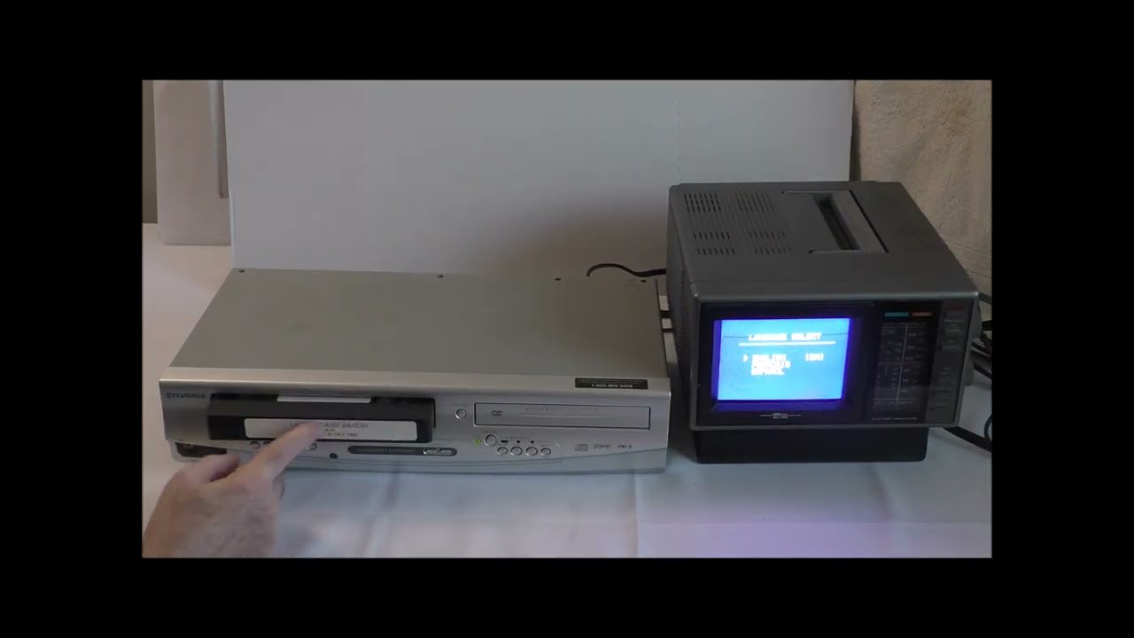 Sylvania DVC-840F DVD Player-Video Cassette VHS Recorder with working remote, RCA cables, sealed VHS