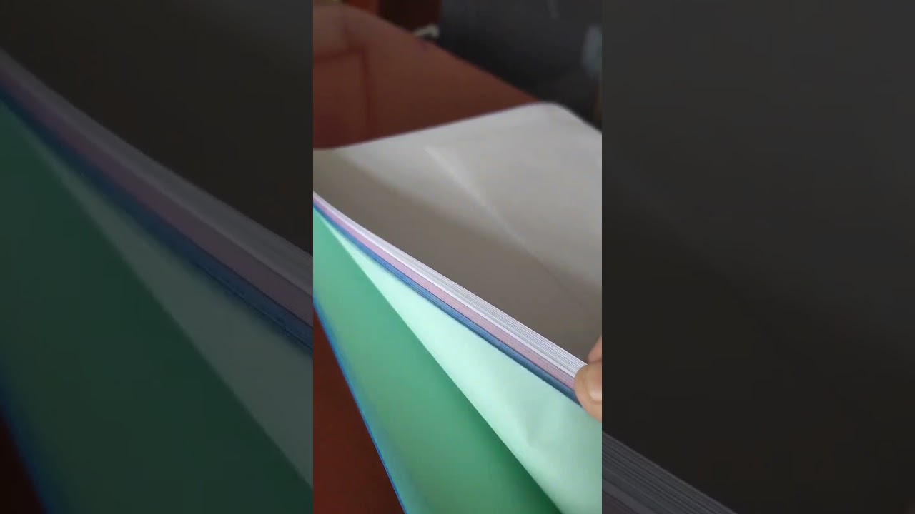 Colored carbonless copy paper