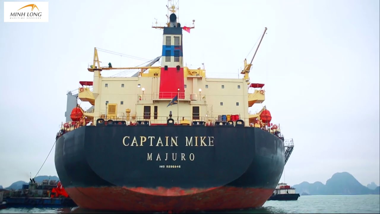MV CAPTAIN MIKE- DISCHARGING IRON ORE AT HON GAI