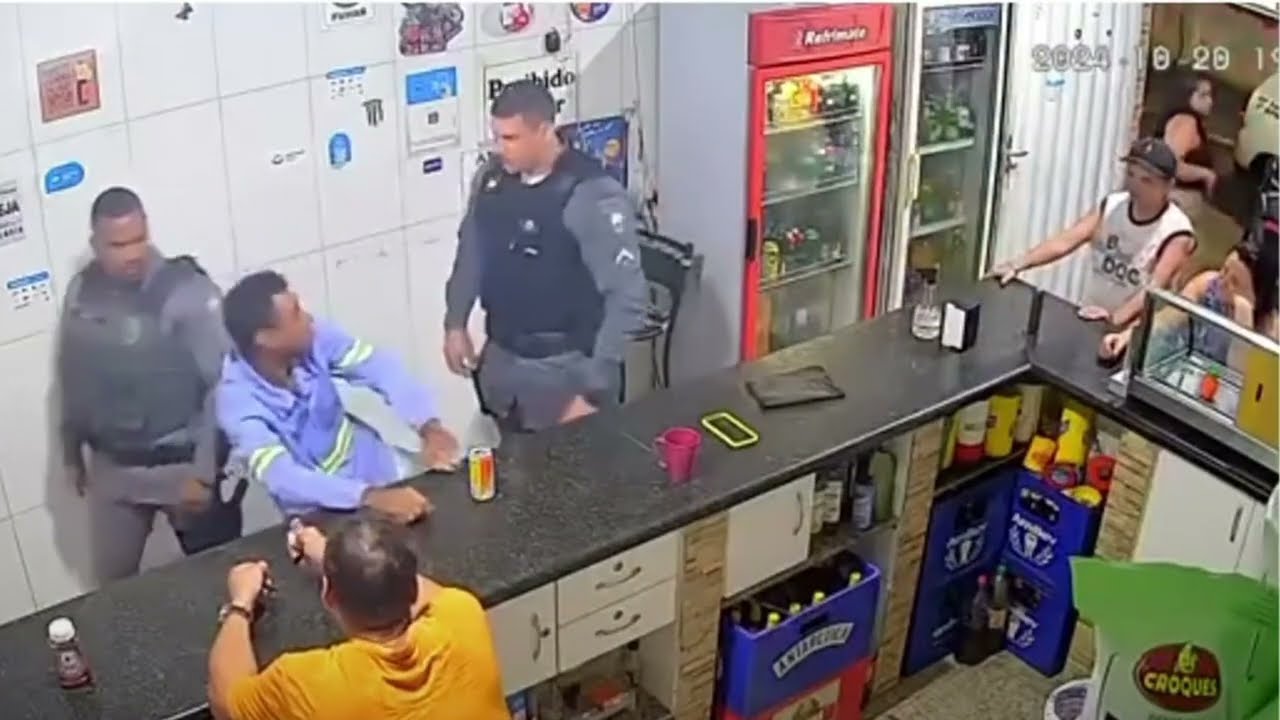 CAMERAS CAPTURE BRAZILIAN POLICE OFFICERS SETTING AN EXAMPLE.