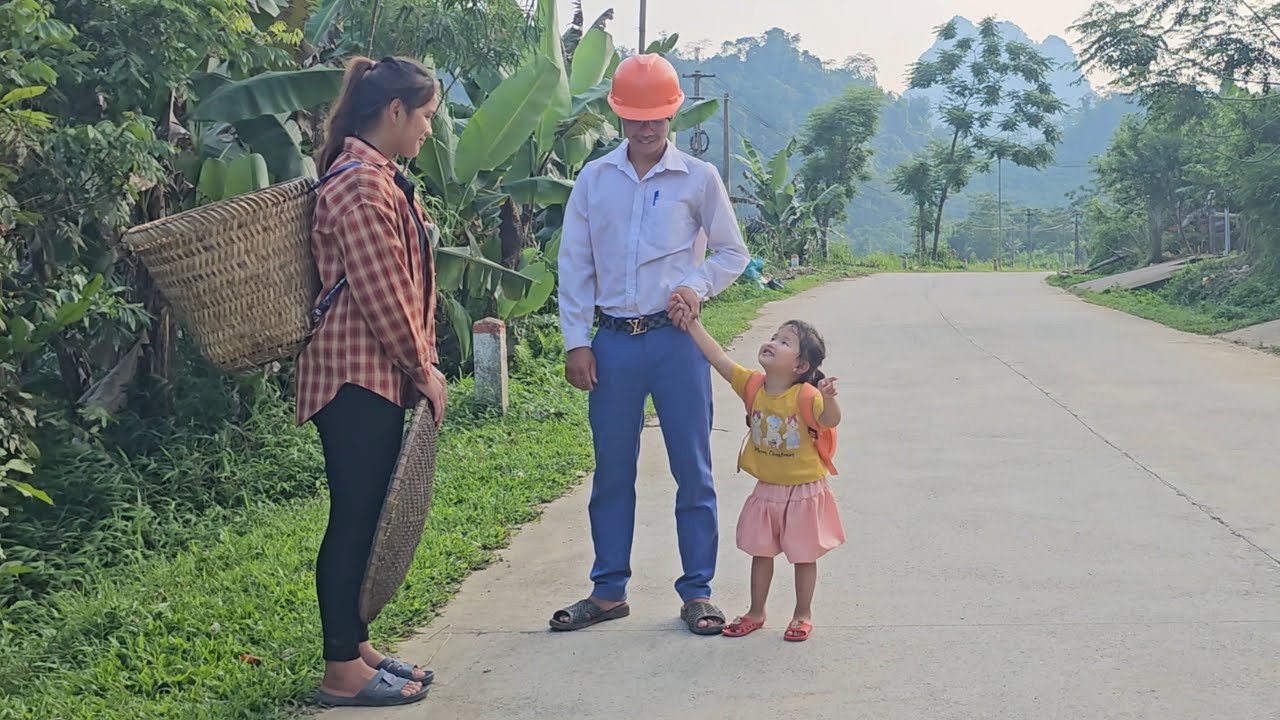 The mother picked up her child from school and met the engineer at work, and he drove them home.