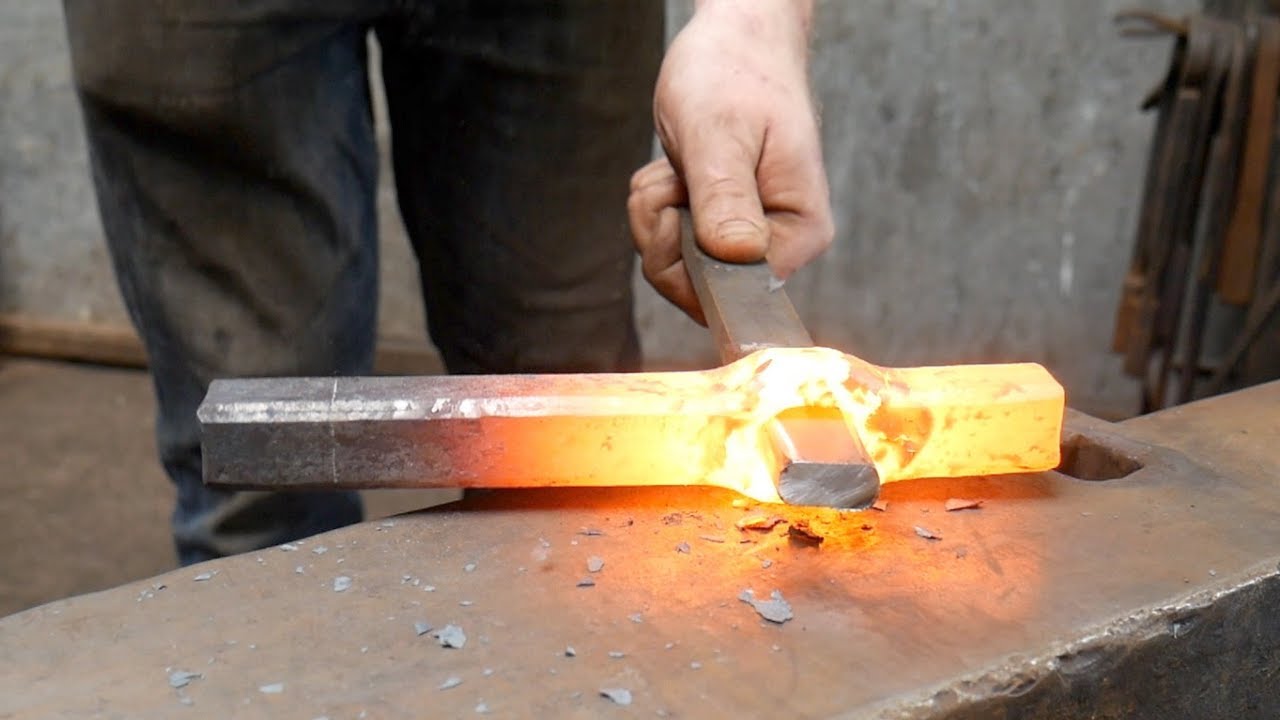 A smart way to hold tools in a the anvil! Blacksmith Helper up date hardy shank and Basic tools