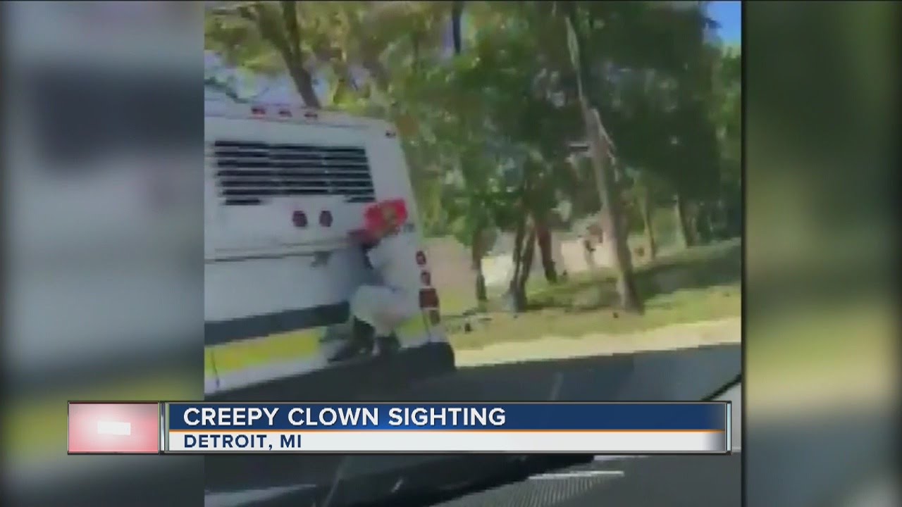 Clown catches a ride on a Detroit bus