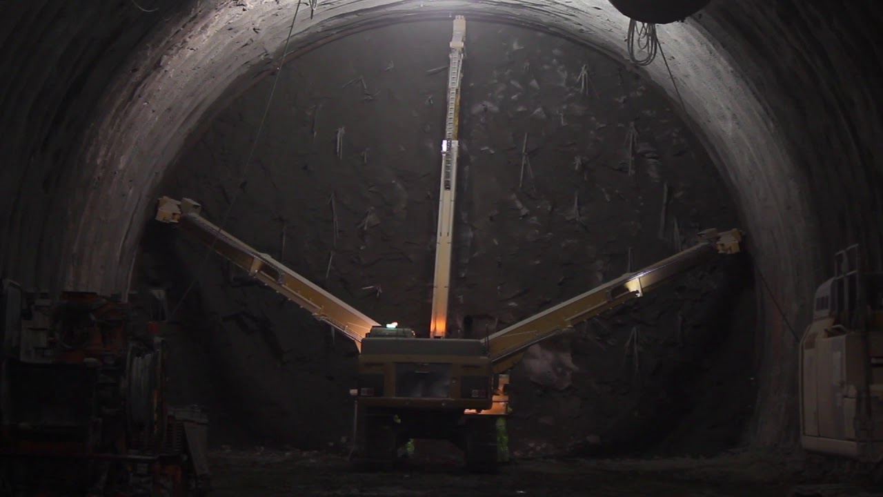 Robotization of the automatic tubular steel arch installation