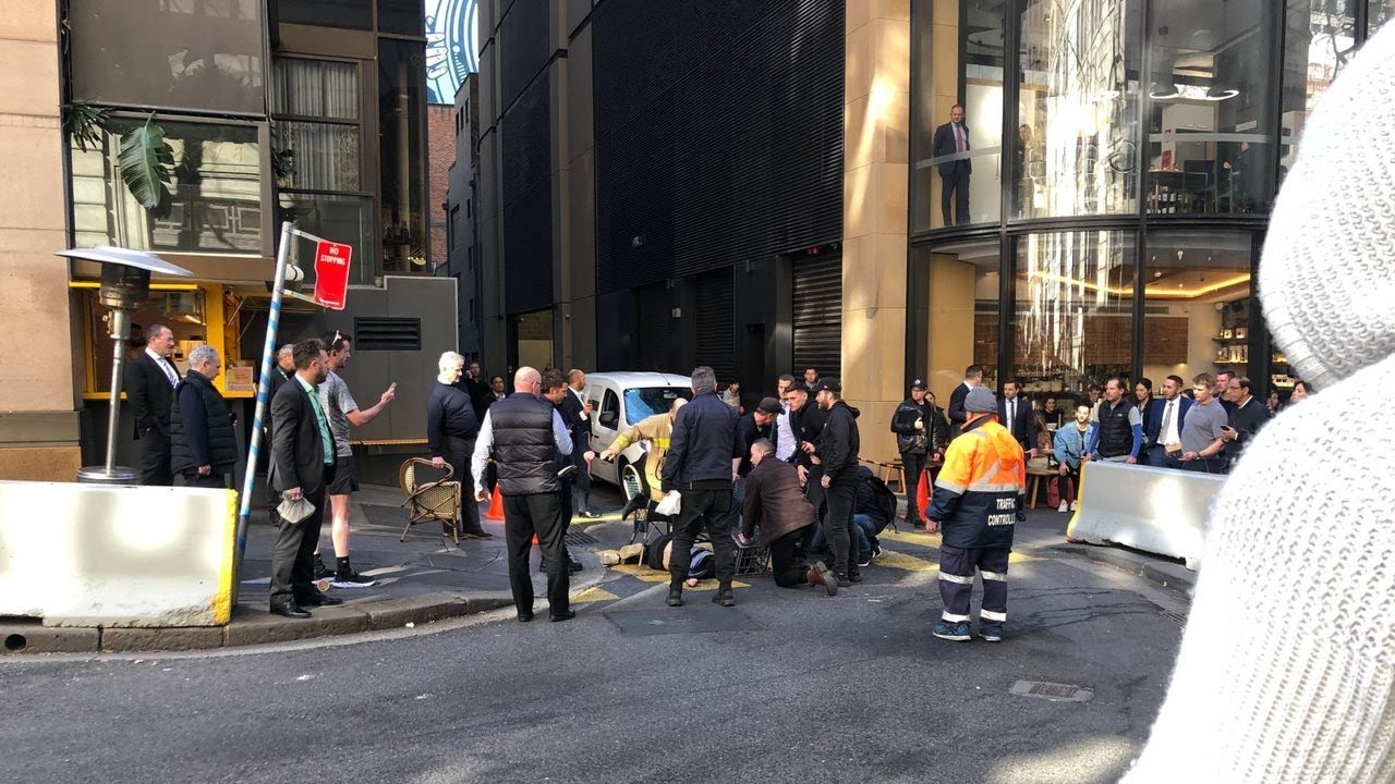Woman stabbed and man in custody after Sydney rampage