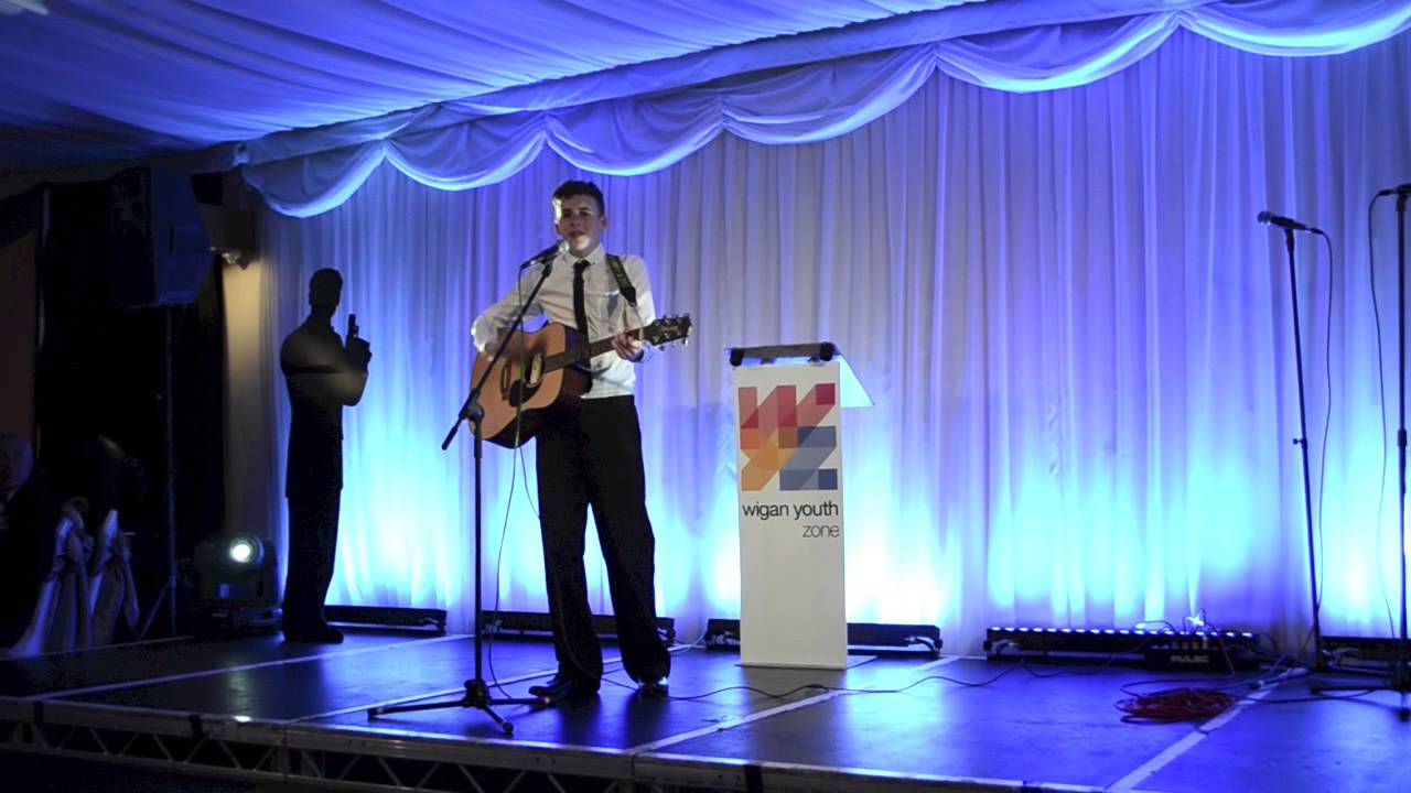Owen Bolton sings I'm a Believer at WYZ Annual Ball