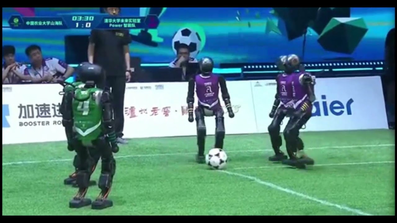 Stupid Humanoid Robots Stumble through football Match in China.