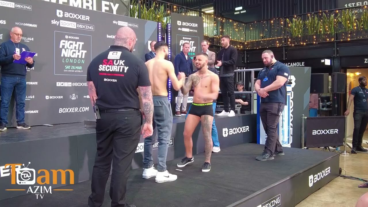 WEIGH-IN HASSAN AZIM face to face with his opponent!