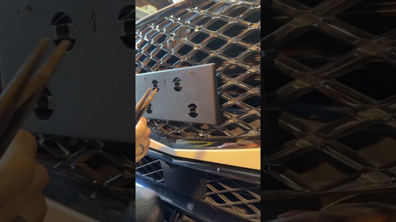 Genesis front license plate holder removal