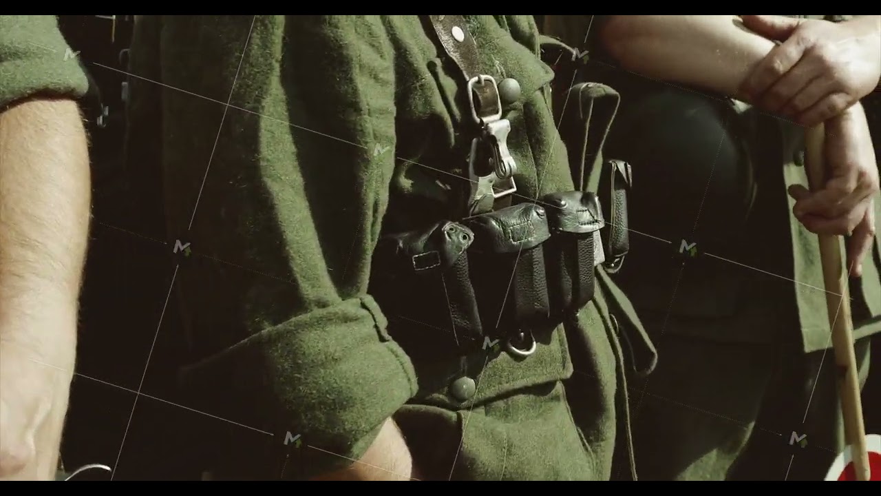 Close-up View On Re-enactor Dressed As German Wehrmacht Infantry Soldier In World War Ii. German
