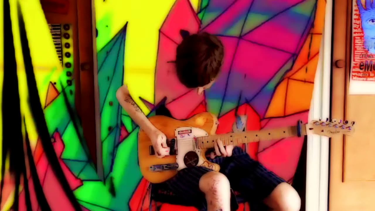 Improvised guitar solo looping over itself, missing finger, lo-fi Zoom recording