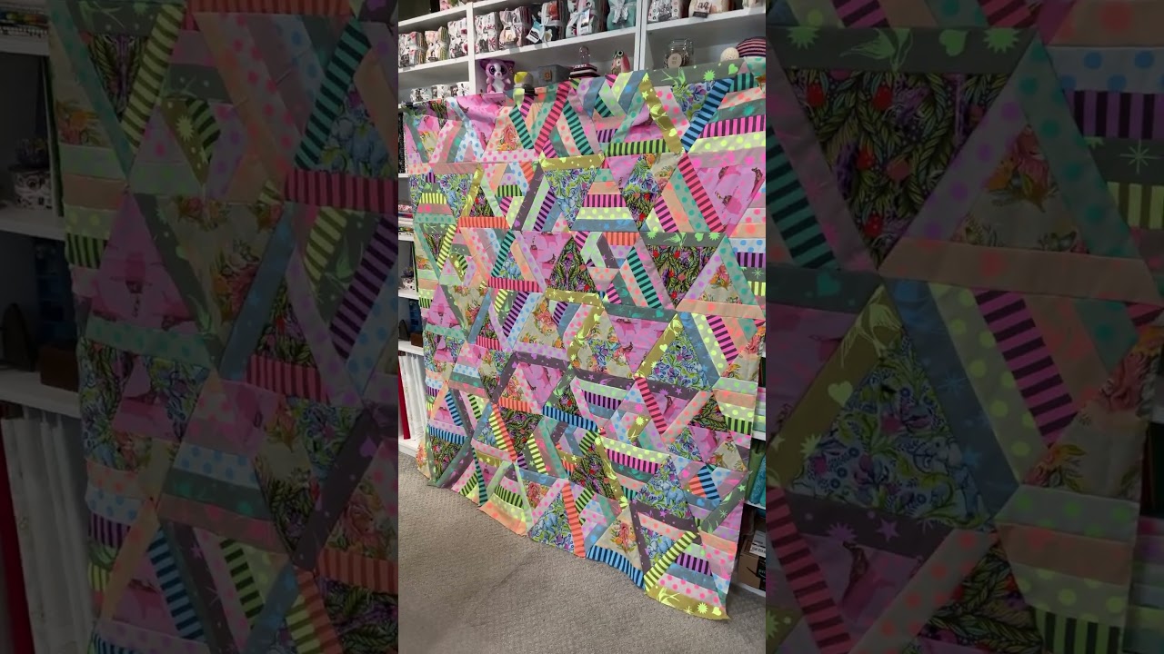 Finished my cozy Posey triangle quilt! 