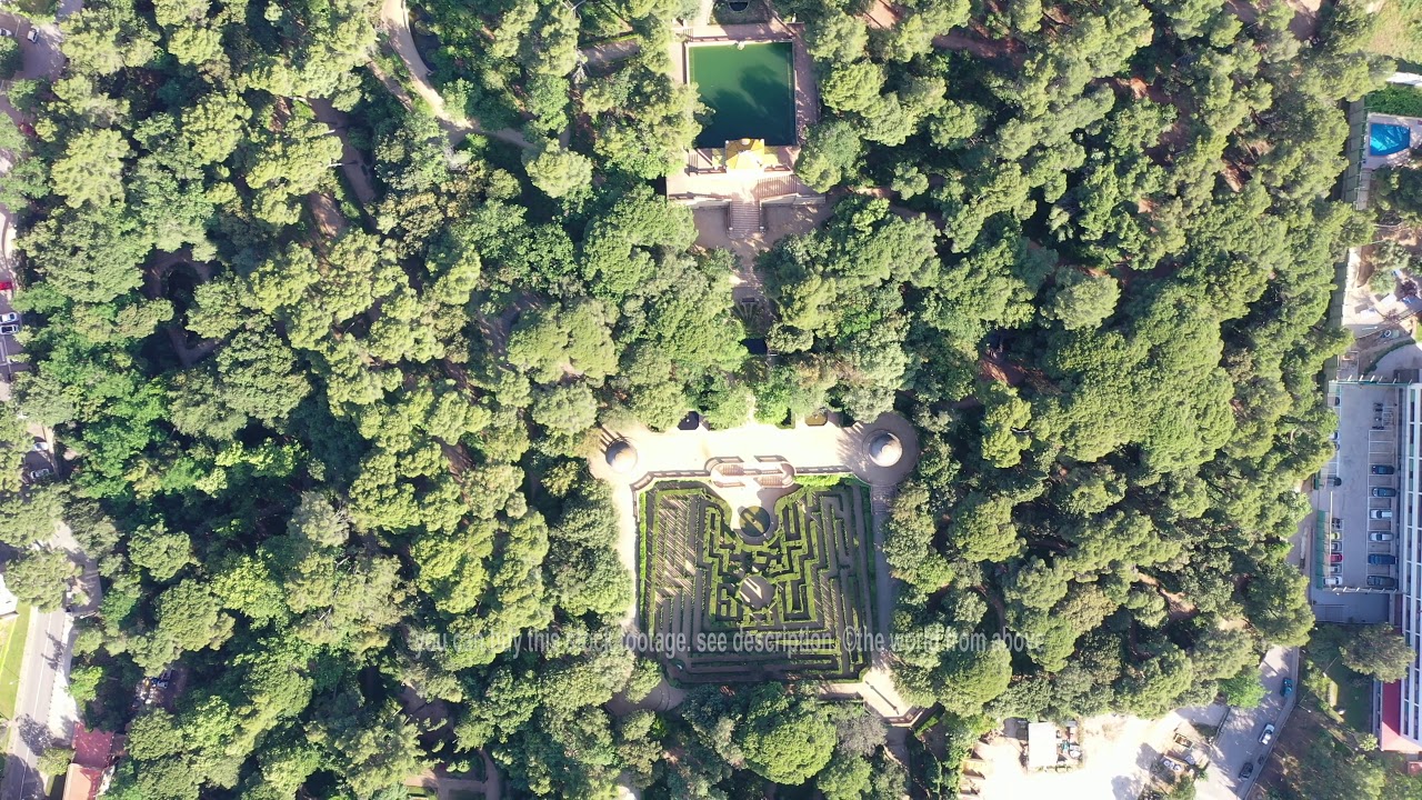 Aerial Stock Footage: Flying with Drone over Labyrinth Park of Horta in City Barcelona