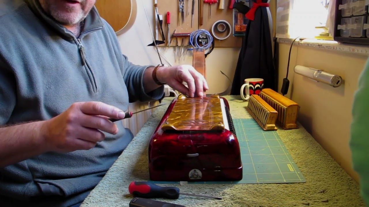 Accordion repair-removing and replacing a bass strap