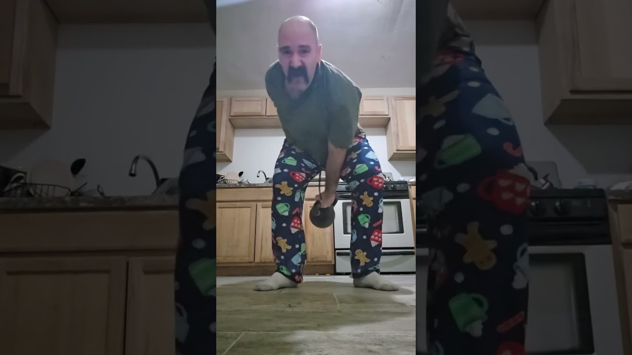 Kettlebell snatch, 18kg, 400 reps in 20 minutes. 