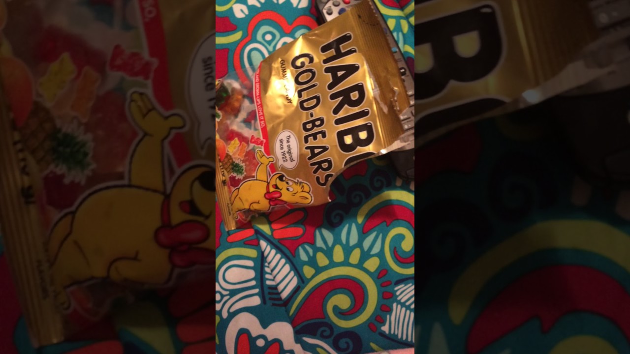 ASMR LOUD WET eating gummy bears while showing hello kitty stuff