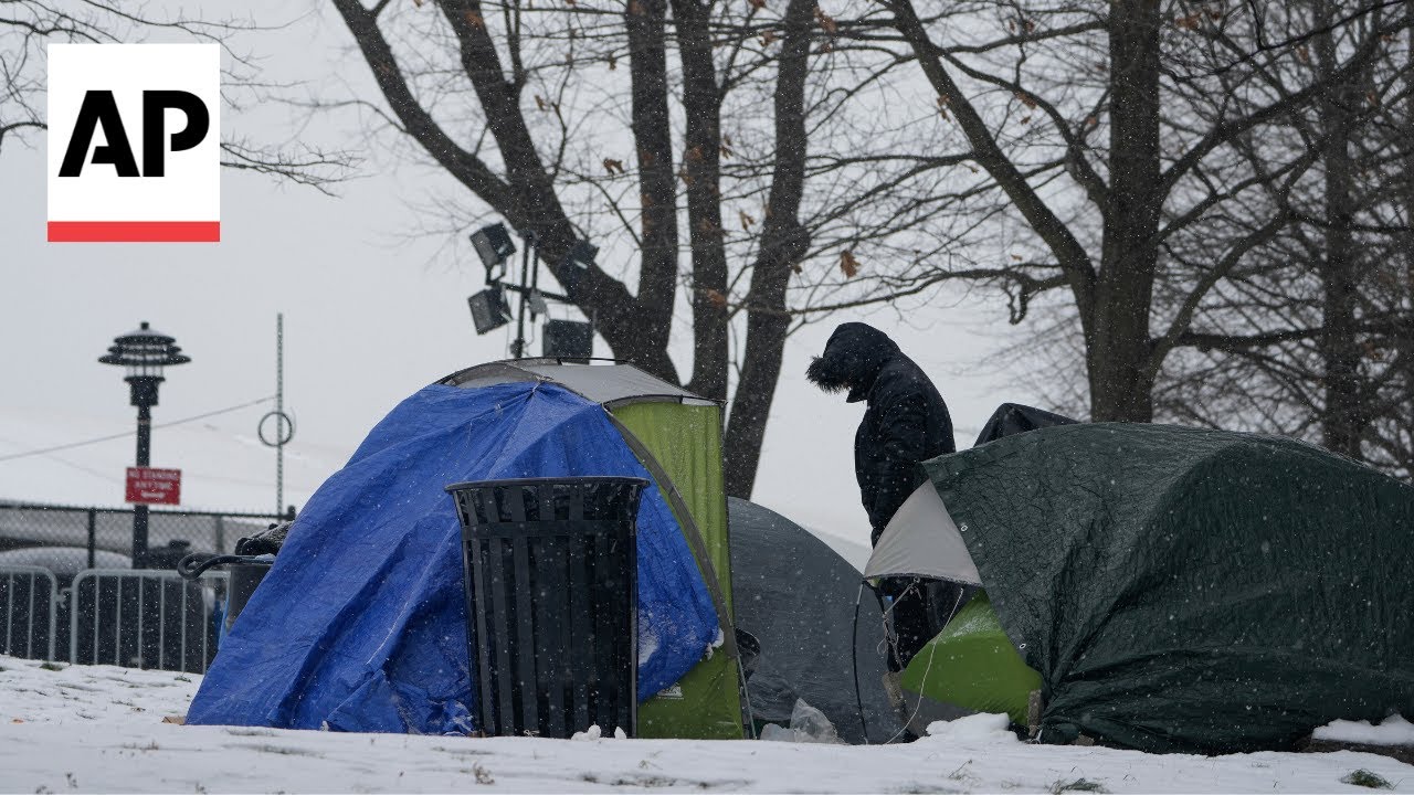 Tent camp outside NYC's largest migrant shelter is growing
