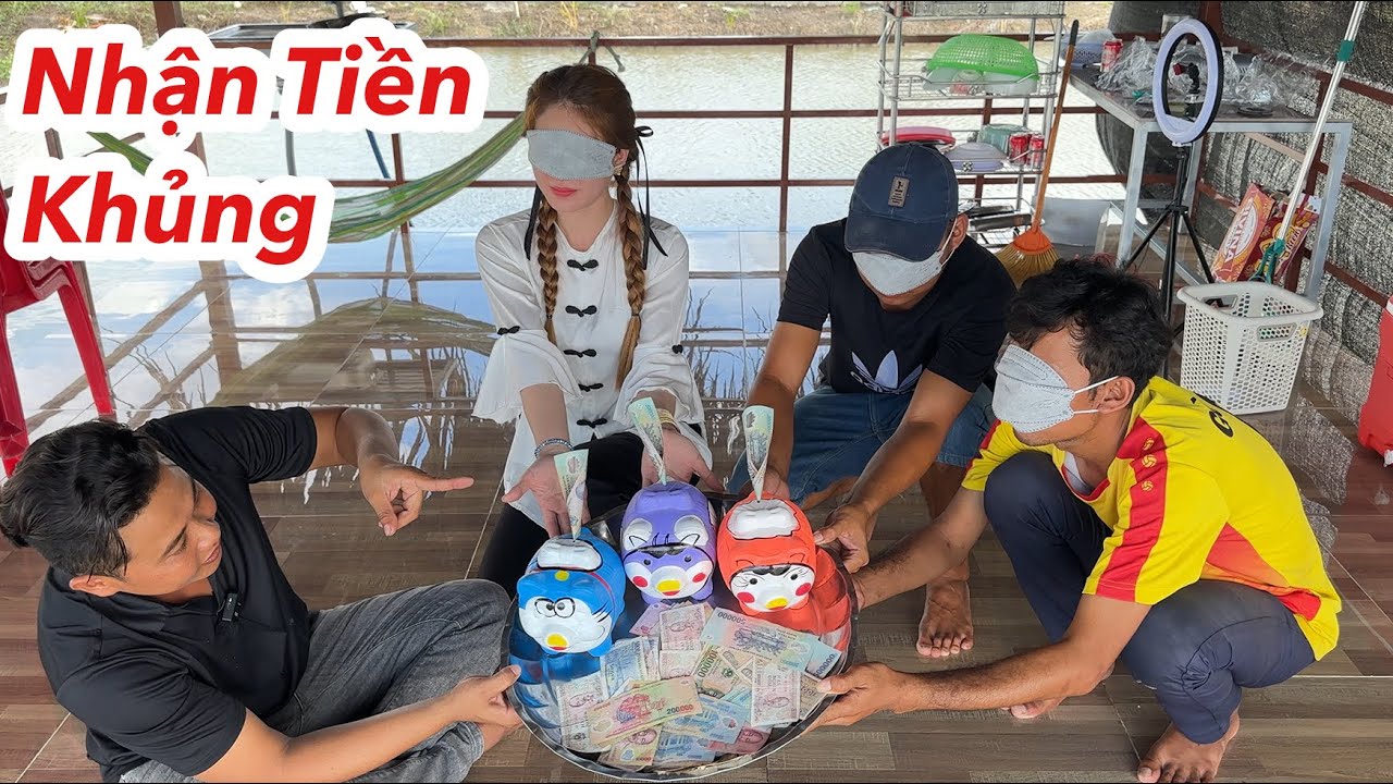 Thử Thách Bịt Mắt Bỏ Tiền Vào Heo Đất Nhận Tiền Khủng Từ Heo Được Tiền Nhiều Nhất