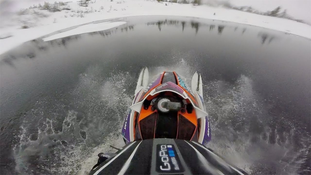 Crazy GIRL rides SNOWMOBILE over water!