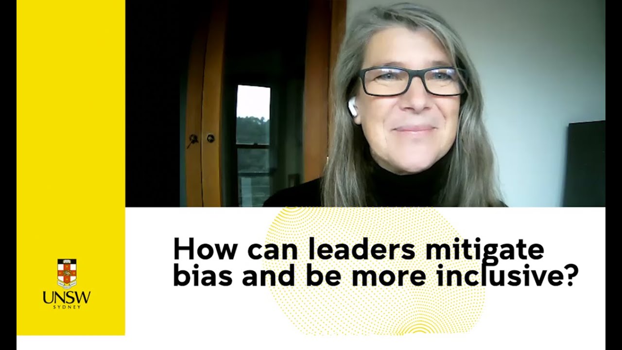 How can leaders mitigate biases and be more inclusive?
