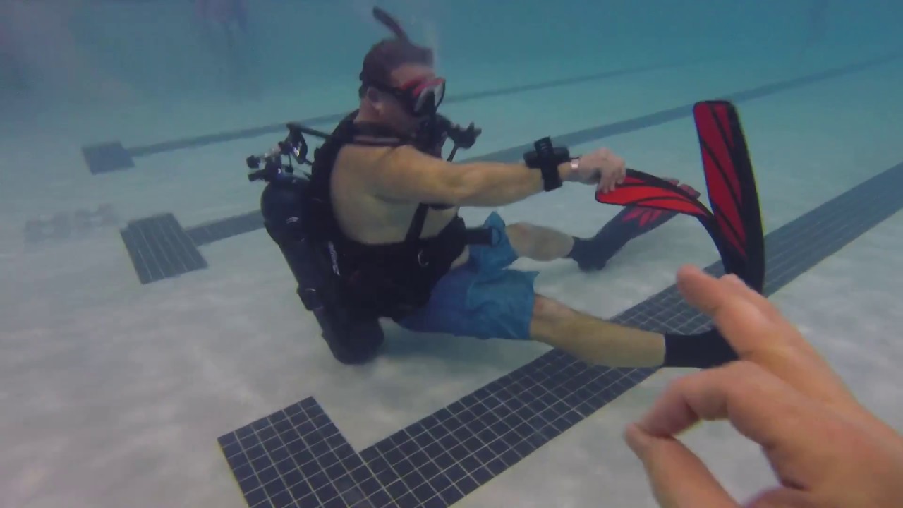 Scuba Confined water training cramp removal, air sharing