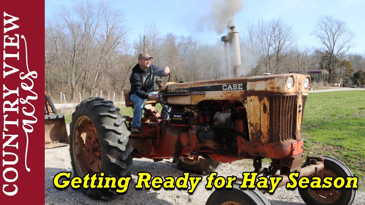 Changing oil in 1961 Case 730 tractor  |  First use of Lube Shuttle Grease gun.