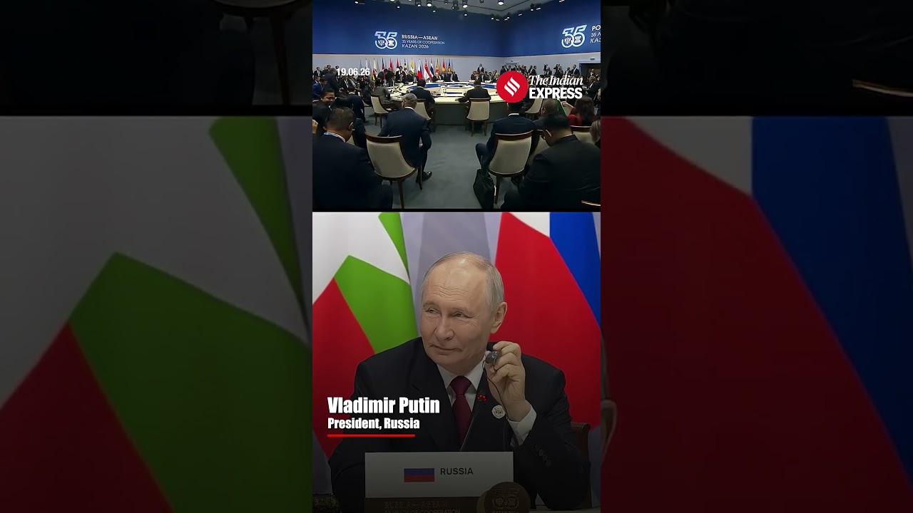 Putin Helps Guest With Translation Headset