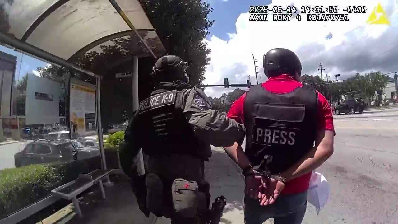 Police bodycam video of Hispanic journalist arrested during Georgia ICE protest