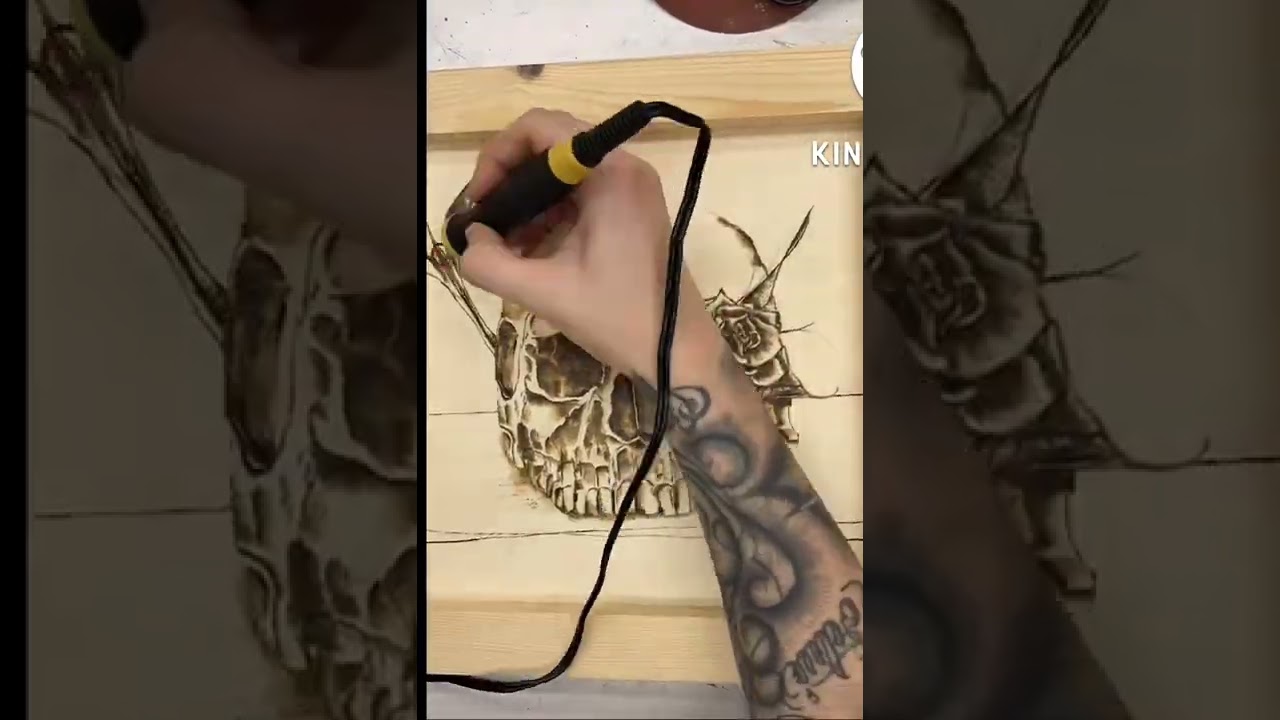 Pyrography/woodburned art piece of a floral skull