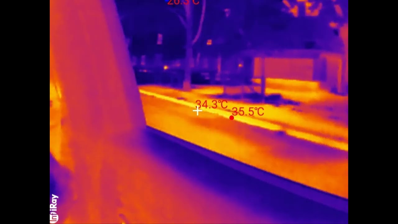 IR camera footage of driving around the city