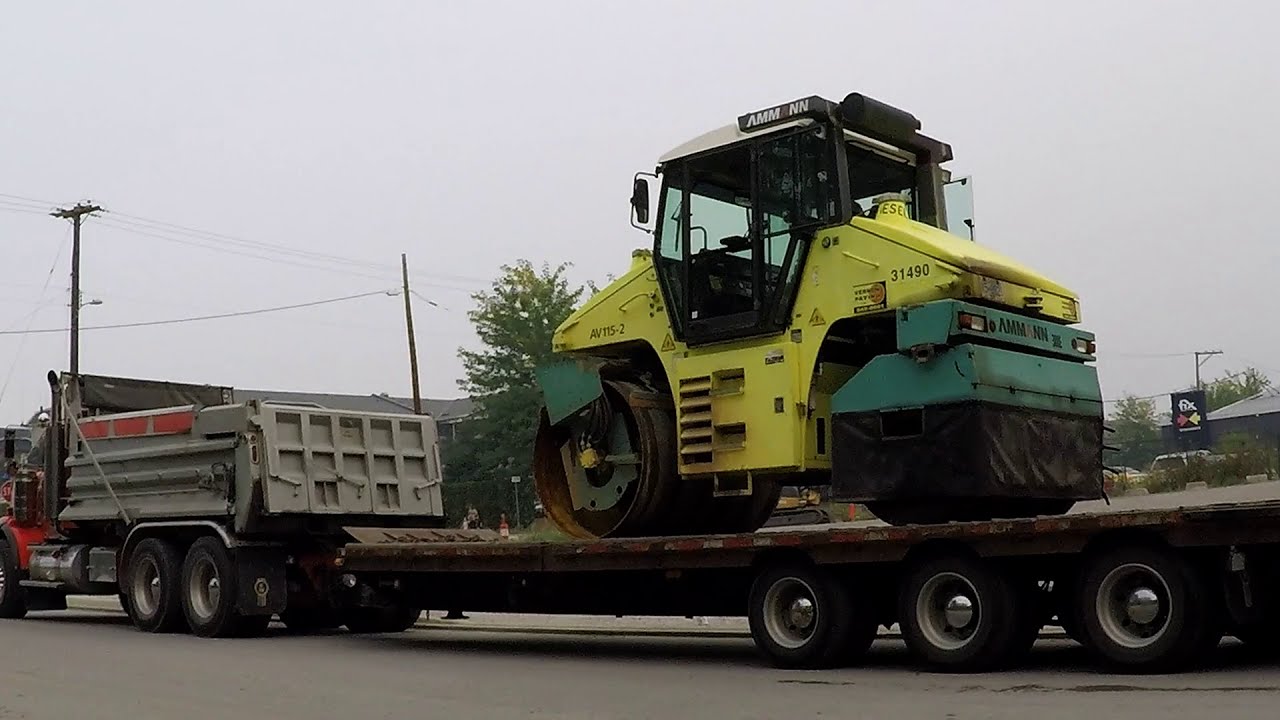 LOADING ASPHALT PAVING EQUIPMENT: CAT 236 SKID STEER & AMMANN AV155-2 COMPACTOR / DUMP TRUCKS #23